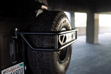 Load image into Gallery viewer, DV8 Offroad 21-23 Ford Bronco Spare Tire Guard & Accessory Mount