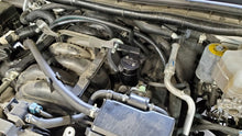 Load image into Gallery viewer, J&L 17-24 Nissan Armada / 14-24 Infiniti QX80 5.6L Driver Side Oil Separator 3.0 - Black Anodize