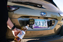 Load image into Gallery viewer, DV8 Offroad Universal License Plate Mount w/ Pod Light Mounts
