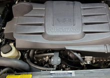 Load image into Gallery viewer, J&amp;L 16-24 Nissan Titan 5.6L Passenger Side Oil Separator 3.0 - Black Anodized
