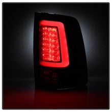 Load image into Gallery viewer, Spyder 09-16 Dodge Ram 1500 Light Bar LED Tail Lights - Black ALT-YD-DRAM09V2-LED-BK
