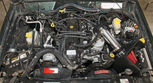 Load image into Gallery viewer, Spectre 91-01 Jeep Cherokee L6-4.0L F/I Air Intake Kit - Polished w/Red Filter
