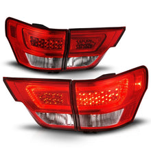 Load image into Gallery viewer, ANZO 11-13 Jeep Grand Cherokee LED Taillights w/ Lightbar Chrome Housing Red/Clear Lens 4pcs
