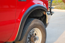 Load image into Gallery viewer, Lund 99-07 Ford F-250 SX-Sport Style Textured Elite Series Fender Flares - Black (4 Pc.)
