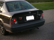 Load image into Gallery viewer, Spyder Toyota Tercel 95-98 Euro Style Tail Lights Black ALT-YD-TTER95-BK
