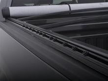 Load image into Gallery viewer, Lund 17-23 Ford F-250/350 Super Duty (6.8ft. Bed) Genesis Snap Tonneau Cover - Black
