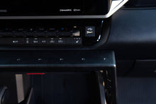 Load image into Gallery viewer, DV8 Offroad 22-23 Toyota Tundra Center Console Molle Panels/Device Mount
