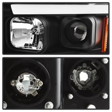 Load image into Gallery viewer, Spyder 02-05 Dodge Ram 1500 Light Bar Projector Headlights - Black (PRO-YD-DR02V2-LB-BK)
