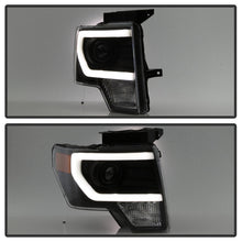 Load image into Gallery viewer, xTune Ford F150 Projector Headlights - Light Bar DRL - Black PRO-JH-FF15009-LBDRL-BK

