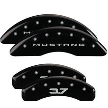 Load image into Gallery viewer, MGP 2 Caliper Covers Engraved Front Oval Logo/Ford Yellow Finish Blk Char 2004 Ford Focus
