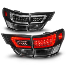 Load image into Gallery viewer, ANZO 11-13 Jeep Grand Cherokee LED Taillights w/ Lightbar Black Housing/Clear Lens 4pcs
