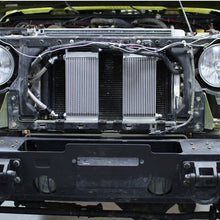 Load image into Gallery viewer, Mishimoto 07-11 Jeep Wrangler JK Oil Cooler Kit - Silver
