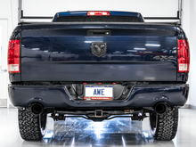 Load image into Gallery viewer, AWE Tuning 09-18 RAM 1500 5.7L (w/Cutouts) 0FG Dual Rear Exit Cat-Back Exhaust - Chrome Silver Tips
