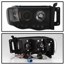 Load image into Gallery viewer, Spyder Dodge Ram 1500 02-05 03-05 Projector Headlights LED Halo LED Blk Smke PRO-YD-DR02-HL-BSM
