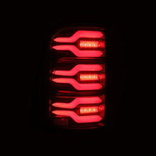 Load image into Gallery viewer, AlphaRex 19-21 Dodge Ram 1500 Luxx-Series LED Tail Lights Black/Red w/Activ Light/Seq Signal

