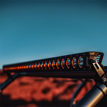 Load image into Gallery viewer, Rigid Industries Revolve 10in Bar w/Amber Trim Ring
