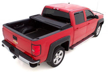 Load image into Gallery viewer, Lund 05-15 Toyota Tacoma (5ft. Bed) Genesis Elite Tri-Fold Tonneau Cover - Black
