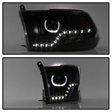 Load image into Gallery viewer, xTune Dodge Ram 2009-2014 Halo LED Projector Headlights - Black PRO-JH-DR09-CFB-BK

