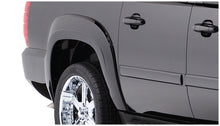 Load image into Gallery viewer, Bushwacker 07-14 Chevy Suburban 1500 OE Style Flares 4pc Does Not Fit LTZ - Black
