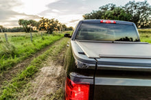 Load image into Gallery viewer, Roll-N-Lock 09-14 Ford F-150 XSB 67in A-Series Retractable Tonneau Cover
