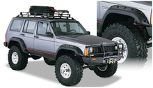 Load image into Gallery viewer, Bushwacker 84-01 Jeep Cherokee Cutout Style Flares 4pc Fits 4-Door Sport Utility Only - Black
