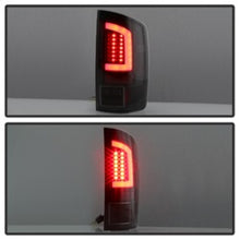 Load image into Gallery viewer, Spyder 03-06 Dodge Ram 2500/3500 V3 Light Bar LED Tail Light - Black (ALT-YD-DRAM02V3-LBLED-BK)
