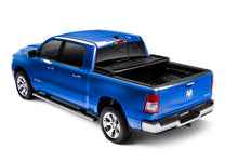 Load image into Gallery viewer, Lund 19-23 RAM 1500 (6.5ft Bed w/o RamBox Cargo Mgmt) Genesis Elite Tri-Fold Tonneau Cover - Black
