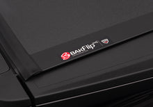Load image into Gallery viewer, BAK 08-16 Ford Super Duty 6ft 9in Bed BAKFlip MX4 Matte Finish
