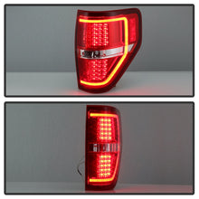 Load image into Gallery viewer, xTune 09-14 Ford F-150 Light Bar LED Tail Lights - Red Clear (ALT-JH-FF15009-LBLED-RC)
