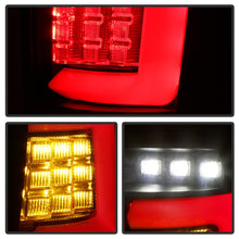 Load image into Gallery viewer, Spyder 99-04 Jeep Grand Cherokee - Light Bar Led Tail Lights - Black - ALT-YD-JGC99V3-BK

