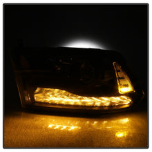 Load image into Gallery viewer, xTune Dodge Ram 13-17 ( w/ Factory Projector LED) Projector Headlight - Black HD-JH-DR13-P-BK

