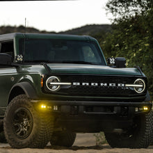 Load image into Gallery viewer, Baja Designs 21-22 Ford Bronco w/Steel Bumper S2 SAE Sportsmen Fog Pkt Light Kit w/Upfitter - Amber
