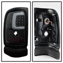 Load image into Gallery viewer, xTune Dodge Ram 1500 94-01 Tail Lights - Light Bar LED - Black ALT-ON-DRAM94V3-LBLED-BK
