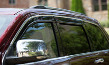 Load image into Gallery viewer, AVS 07-10 Infiniti G35 Ventvisor Low Profile Deflectors 4pc - Smoke w/Chrome Trim

