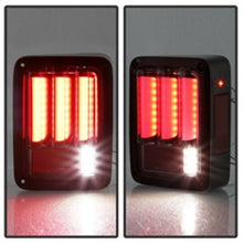 Load image into Gallery viewer, Spyder 07-16 Jeep Wrangler Version 2 Light Bar LED Tail Lights - Red Clear (ALT-YD-JWA07V2-LBLED-RC)
