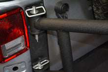 Load image into Gallery viewer, DV8 Offroad 07-18 Jeep Wrangler Body Mounted Tire Carrier
