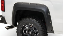 Load image into Gallery viewer, Bushwacker 14-18 GMC Sierra 1500 Pocket Style Flares 2pc 69.3/78.8/97.8in Bed - Black
