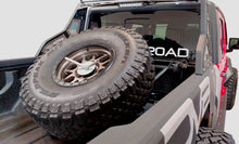 Load image into Gallery viewer, DV8 Offroad 2019+ Jeep Gladiator In-Bed Adjustable Tire Carrier
