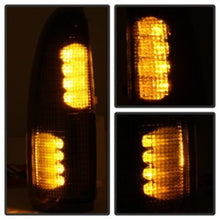 Load image into Gallery viewer, xTune Ford Superduty F250-F650 03-07 Amber LED Mirror Signal Lens - Smoke ACC-LED-FDSD99-MR-SM
