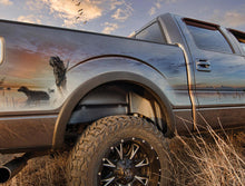 Load image into Gallery viewer, Husky Liners 07-13 Chevy/GMC Silverado/Sierra Black Rear Wheel Well Guards
