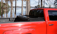 Load image into Gallery viewer, Lund 21-23 Ford F-150 (5.5ft. Bed) Hard Fold Tonneau Cover - Black
