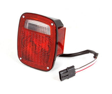 Load image into Gallery viewer, Omix Tail Light Black Housing RH 87-90 Jeep Wrangler
