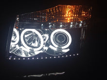 Load image into Gallery viewer, Spyder Nissan Titan 04-14/Armada 04-07 Projector Headlights CCFL Halo LED Blk PRO-YD-NTI04-CCFL-BK
