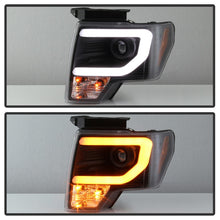 Load image into Gallery viewer, Spyder 09-14 Ford F-150 Projector Headlights - Halogen Model Light Bar - Blk PRO-YD-FF15009-SBLB-BK

