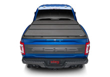 Load image into Gallery viewer, Extang 16-23 Nissan Titan XD w/o Rail Sys. (6ft. 7in. Bed) Solid Fold ALX
