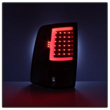 Load image into Gallery viewer, xTune 09-18 Dodge Ram 1500 LED Tail Lights - Black Smoke (ALT-ON-DR09-LBLED-BSM)
