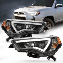 Load image into Gallery viewer, ANZO 14-18 Toyota 4 Runner Plank Style Projector Headlights Black w/ Amber
