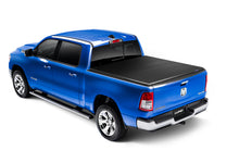 Load image into Gallery viewer, Lund 19-23 RAM 1500 (6.5ft Bed w/o RamBox Cargo Mgmt) Genesis Elite Tri-Fold Tonneau Cover - Black
