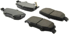 Load image into Gallery viewer, StopTech 07-18 Jeep Wrangler Sport Brake Pads w/Shims and Hardware - Rear
