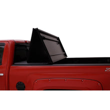 Load image into Gallery viewer, Lund 2022 Toyota Tundra 6.7ft Bed Hard Fold Tonneau Vinyl - Black

